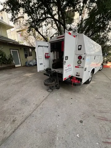 Magnet Plumbing service vehicle on-site for Grease Trap Cleaning in Biscayne Bay Village